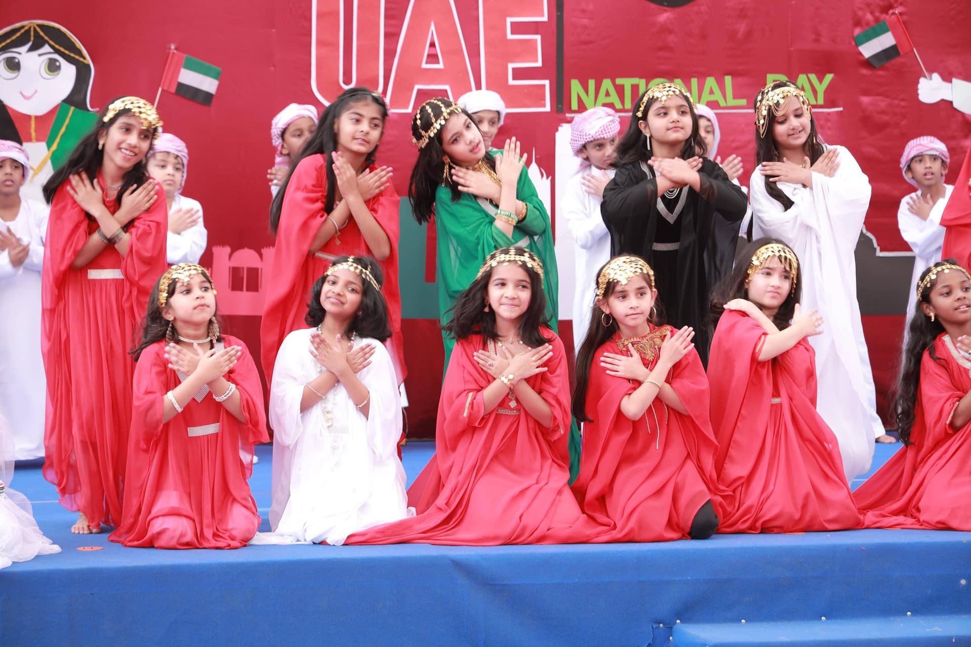 Students performing on stage at the National Day show